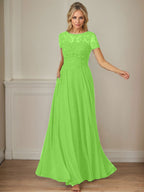 Robe en mousseline de soie bleu marine foncé, coupe trapèze, col bateau et sequins 