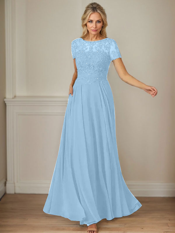 Robe en mousseline de soie bleu marine foncé, coupe trapèze, col bateau et sequins 