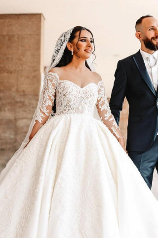 Vestidos de novia de satén hasta el suelo, corte princesa, escote corazón, manga larga y encaje.