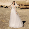 Beach Ivory Lace Wedding Dresses Illusion Long Sleeves Bridal Gowns Jewel Neck Backless Appliqued Tulle A-Line Floor Length