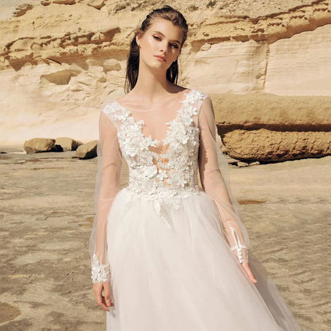 Beach Ivory Lace Wedding Dresses Illusion Long Sleeves Bridal Gowns Jewel Neck Backless Appliqued Tulle A-Line Floor Length