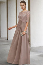 Precioso vestido largo verde de corte A, de encaje y gasa, para la madre de la novia, con mangas.