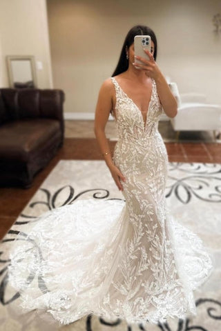 Magnifique robe de mariée longue ivoire sirène col V sans manches en dentelle dos nu