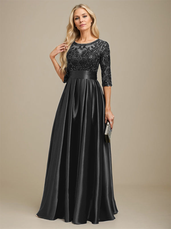 Robe de mariée longue en satin stretch dentelle et dentelle, coupe trapèze, décolleté illusion, ornée d'un nœud à sequins 