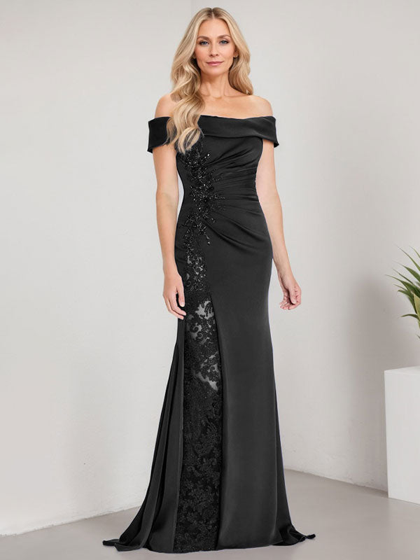 Vestido de corte sirena para la madre de la novia, largo hasta el suelo, con hombros descubiertos, apliques y pedrería, con abertura alta. 