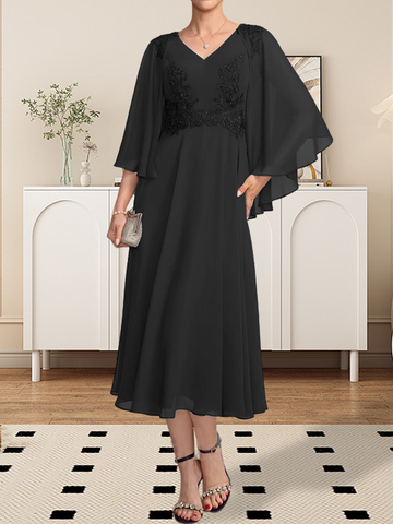 Vestido de corte A, escote en V, largo hasta la rodilla, de gasa, encaje, con lentejuelas y pedrería para la madre de la novia.