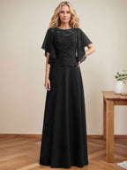 Vestido de novia de corte A, escote redondo, ilusión, largo hasta el suelo, de encaje y gasa con lentejuelas. 
