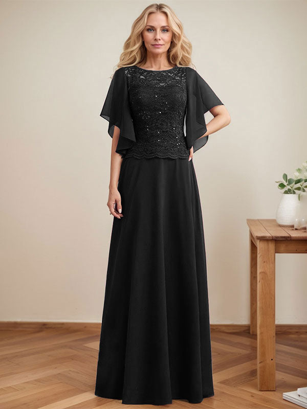 Vestido de novia de corte A, escote redondo, ilusión, largo hasta el suelo, de encaje y gasa con lentejuelas. 