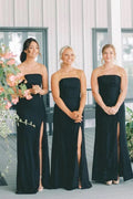 Robe de demoiselle d'honneur longue sirène en satin noir sans manches avec fente