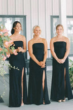 Robe de demoiselle d'honneur longue sirène en satin noir sans manches avec fente
