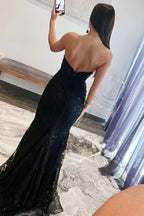 Vestido largo de fiesta con escote corazón, apliques de encaje y tul estilo sirena.