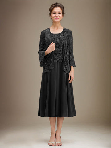 Vestido de novia de corte línea A, escote redondo, largo hasta la rodilla, de encaje y gasa con lentejuelas. 