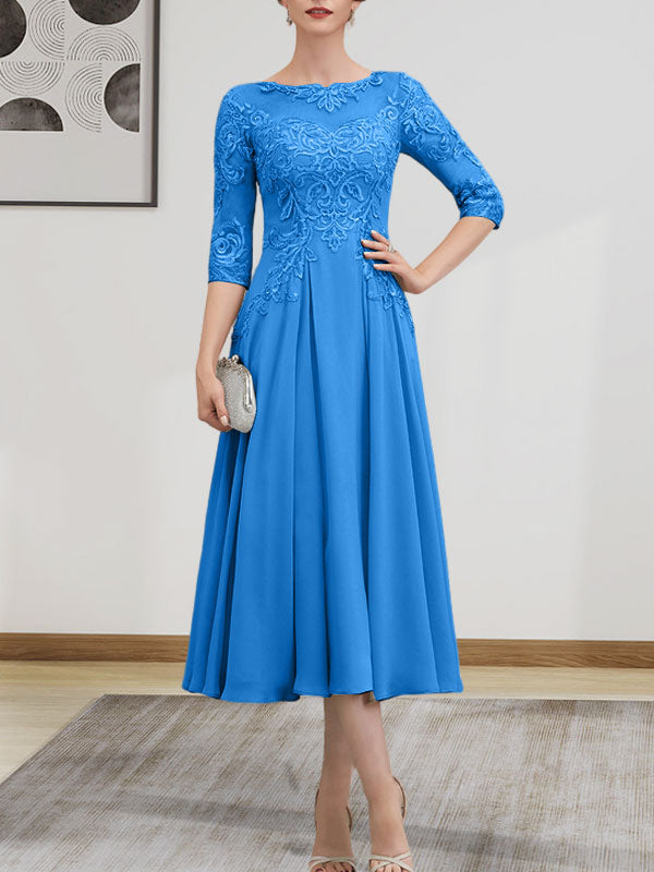 Vestido de novia de corte A, escote redondo ilusión, largo té, de gasa, encaje, con lentejuelas y pedrería.