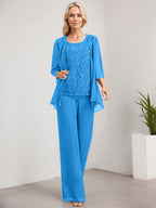 Vestido de novia de gasa con encaje y lentejuelas, estilo mono/pantalón, largo hasta el suelo, con escote redondo.