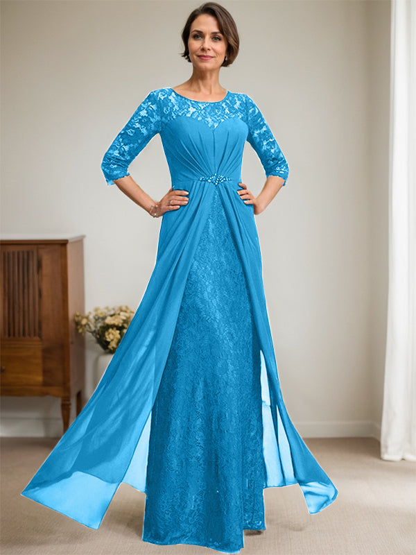 Vestido de novia de corte línea A, escote redondo ilusión, largo hasta el suelo, de gasa de encaje con volantes y pedrería. 