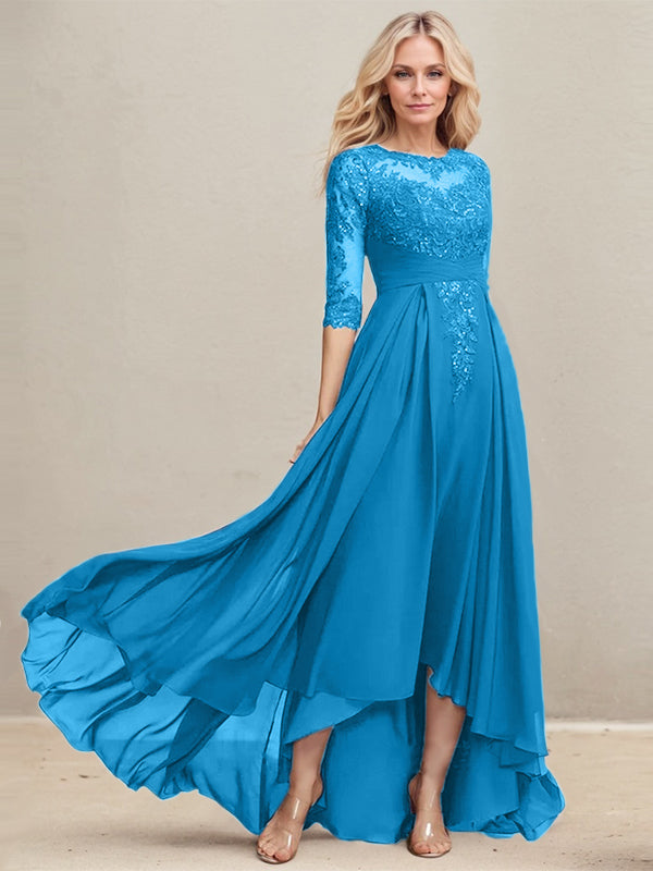 Vestido de madrina de la novia, corte en A, escote redondo ilusión, asimétrico, de encaje y gasa con lentejuelas plisadas. 