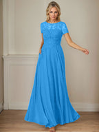 Robe en mousseline de soie bleu marine foncé, coupe trapèze, col bateau et sequins 