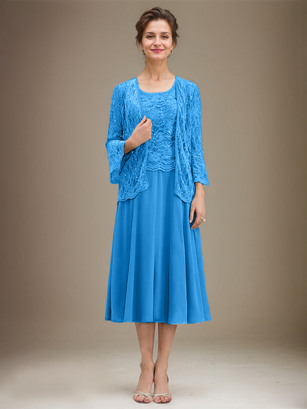 Vestido de novia de corte línea A, escote redondo, largo hasta la rodilla, de encaje y gasa con lentejuelas. 