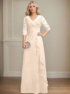 Vestido de novia de corte línea A, cuello en V, largo hasta el suelo, de encaje y gasa, con lentejuelas y volantes en cascada. 