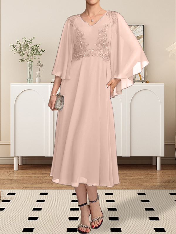 Vestido de corte A, escote en V, largo hasta la rodilla, de gasa, encaje, con lentejuelas y pedrería para la madre de la novia.