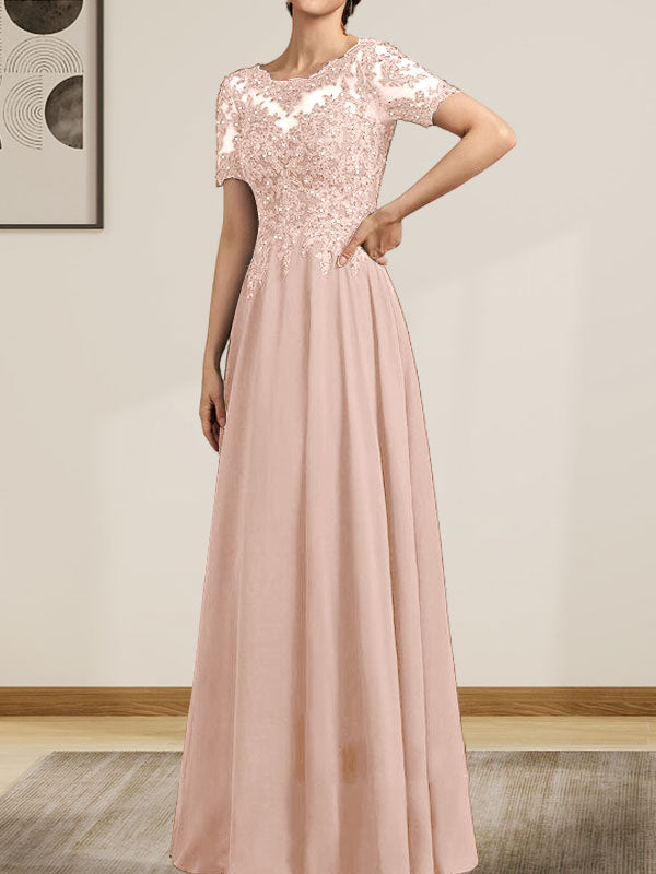 Vestido de corte A, escote ilusión, largo hasta el suelo, de gasa y encaje, con lentejuelas y pedrería, para la madre de la novia.