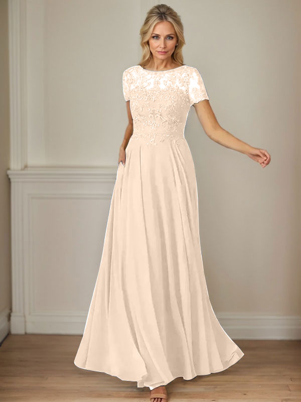 Robe en mousseline de soie bleu marine foncé, coupe trapèze, col bateau et sequins 