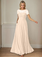 Robe en mousseline de soie bleu marine foncé, coupe trapèze, col bateau et sequins 