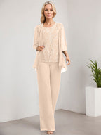 Vestido de novia de gasa con encaje y lentejuelas, estilo mono/pantalón, largo hasta el suelo, con escote redondo.