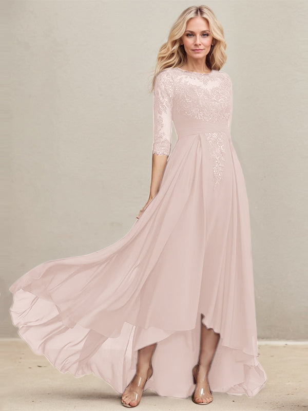 Vestido de madrina de la novia, corte en A, escote redondo ilusión, asimétrico, de encaje y gasa con lentejuelas plisadas. 