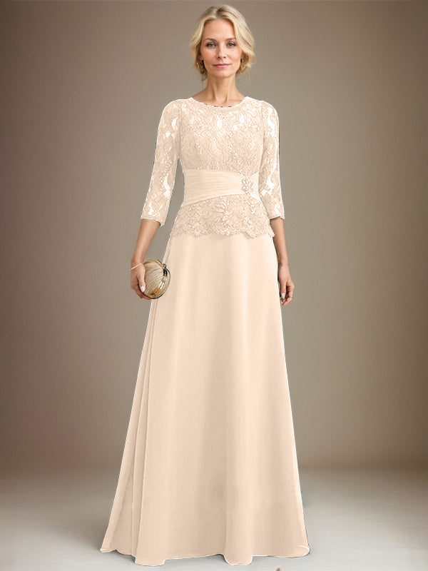 Vestido de corte A, escote ilusión, largo hasta el suelo, de gasa y encaje, para la madre de la novia, con lentejuelas plisadas y pedrería. 