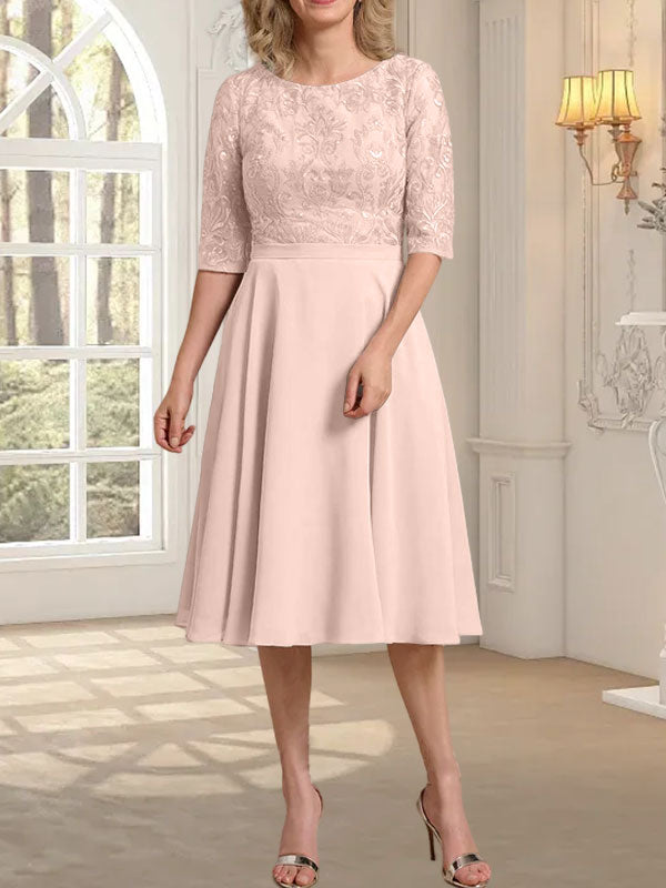 Vestido de novia de gasa de encaje, corte en A, escote redondo y largo hasta la rodilla.