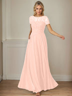 Robe en mousseline de soie bleu marine foncé, coupe trapèze, col bateau et sequins 
