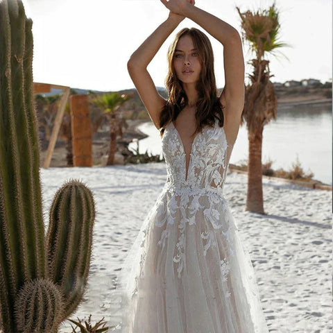 Vestidos de novia bohemios para mujer, sexis, sin espalda, con apliques de encaje, sin mangas, escote en V, corte princesa, ideales para fiestas formales en la playa.