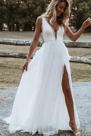 Robe de mariée bohème trapèze, col en V, fente en dentelle et appliques WD560