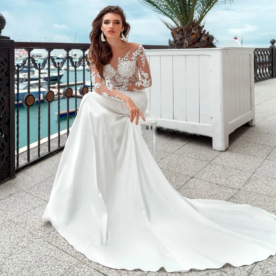 Robes de mariée sirène à manches longues, décolleté rond transparent, boutons en satin appliqués dans le dos, robes de mariée de plage avec traîne balayée 2023 