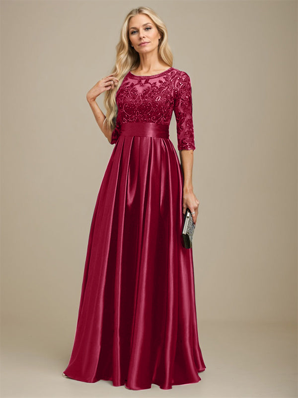 Vestido de madrina de la novia, corte en A, escote ilusión, largo hasta el suelo, satén elástico con encaje y lazo de lentejuelas. 