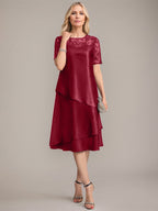 Vestido de corte A, escote redondo, largo hasta la rodilla, para la madre de la novia, con apliques y lentejuelas. 