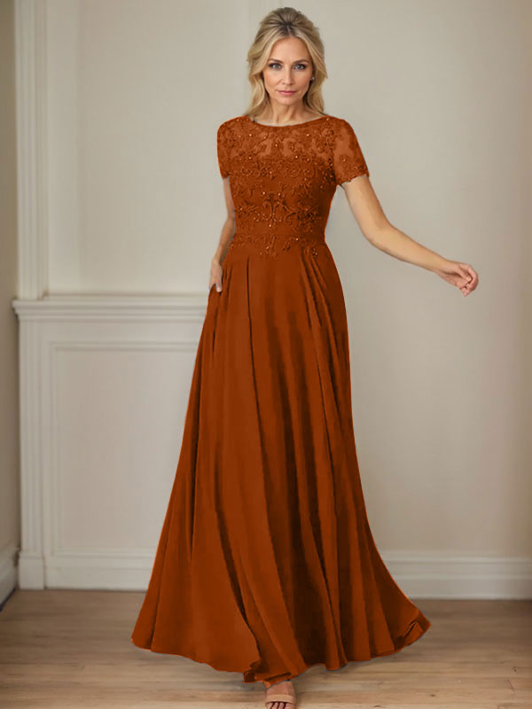 Robe en mousseline de soie bleu marine foncé, coupe trapèze, col bateau et sequins 