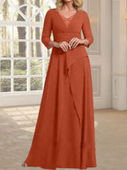 Vestido de gasa de corte A, escote en V, largo hasta el suelo, para la madre de la novia, con plisados ​​y cuentas.