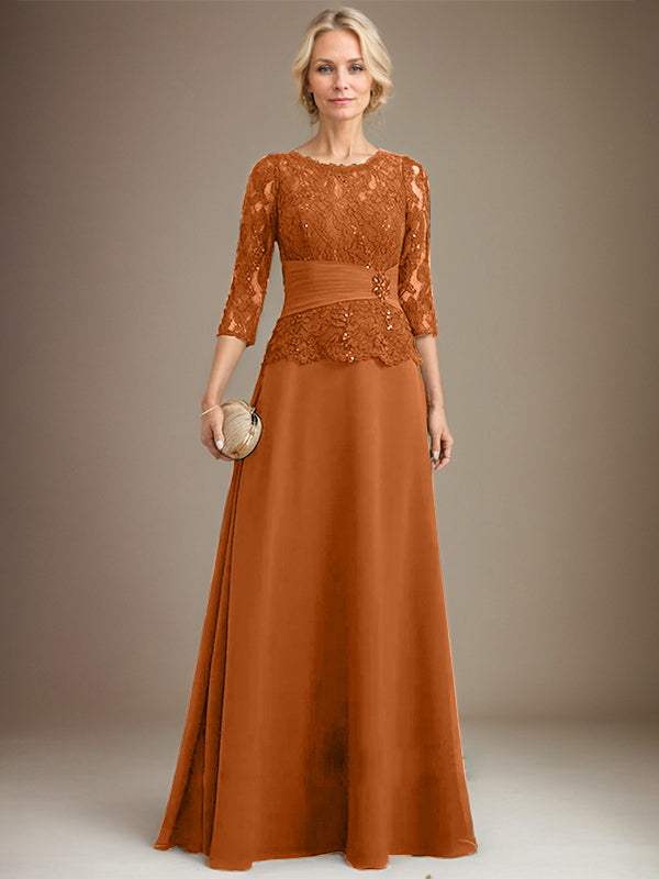 Vestido de corte A, escote ilusión, largo hasta el suelo, de gasa y encaje, para la madre de la novia, con lentejuelas plisadas y pedrería. 