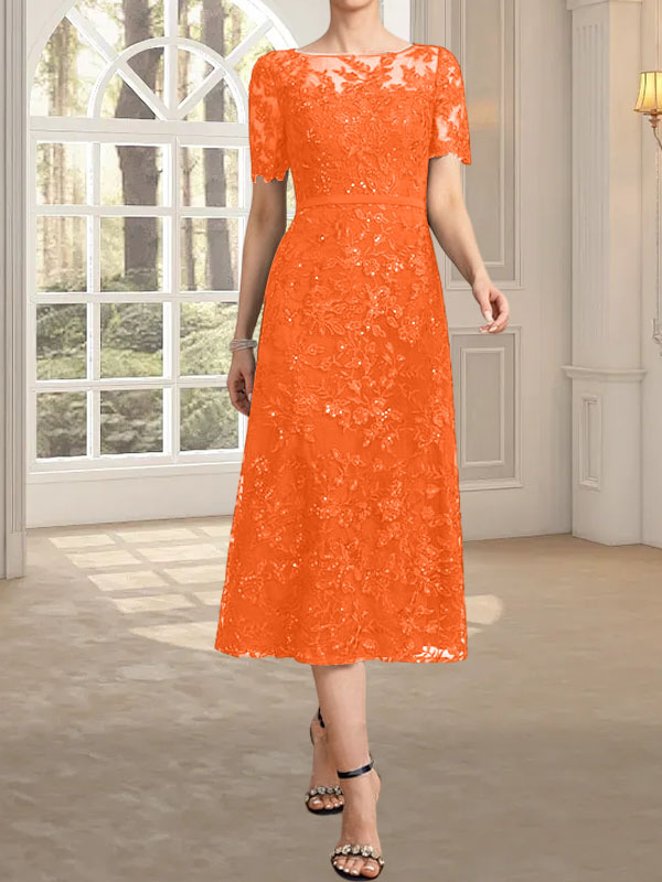 Vestido de novia de encaje con lentejuelas, corte en A, escote redondo ilusión y largo hasta la rodilla.