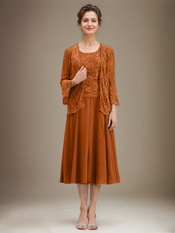 Vestido de novia de corte línea A, escote redondo, largo hasta la rodilla, de encaje y gasa con lentejuelas. 