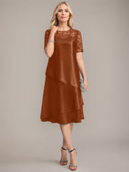 Vestido de corte A, escote redondo, largo hasta la rodilla, para la madre de la novia, con apliques y lentejuelas. 