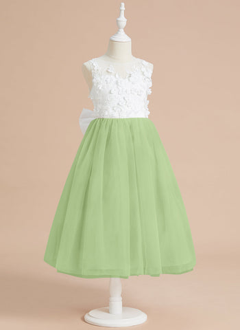 Vestido midi de encaje floral y lazo grande 