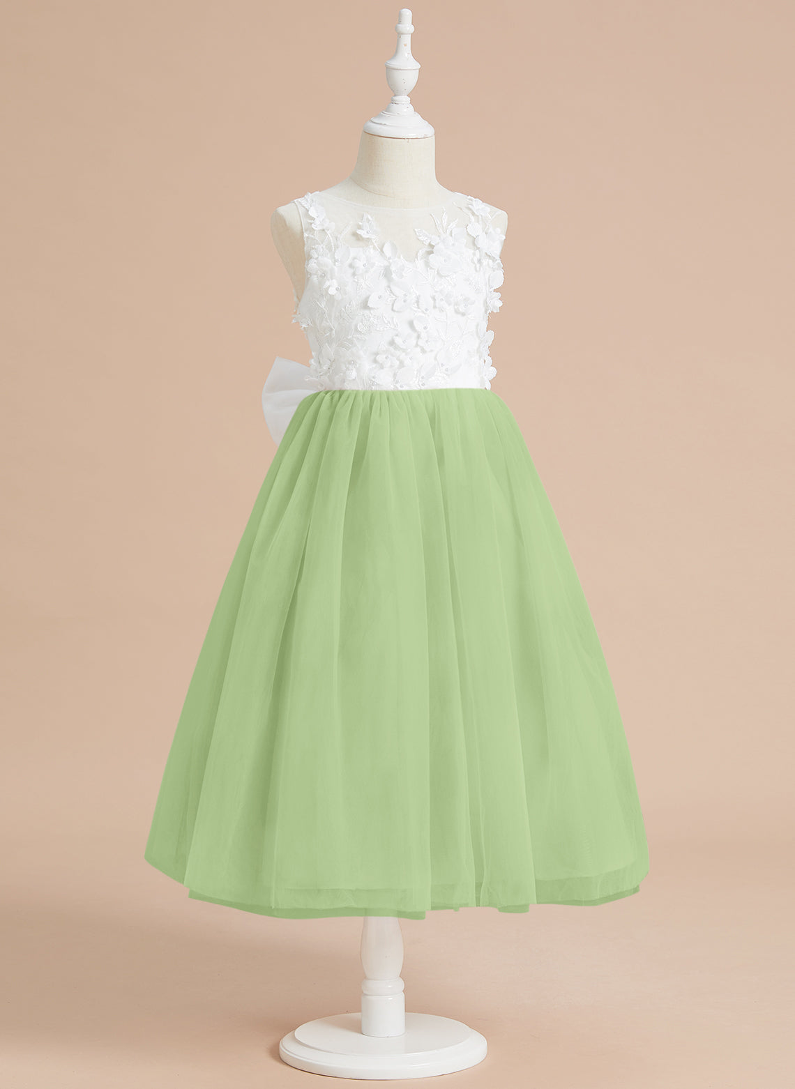 Vestido midi de encaje floral y lazo grande 