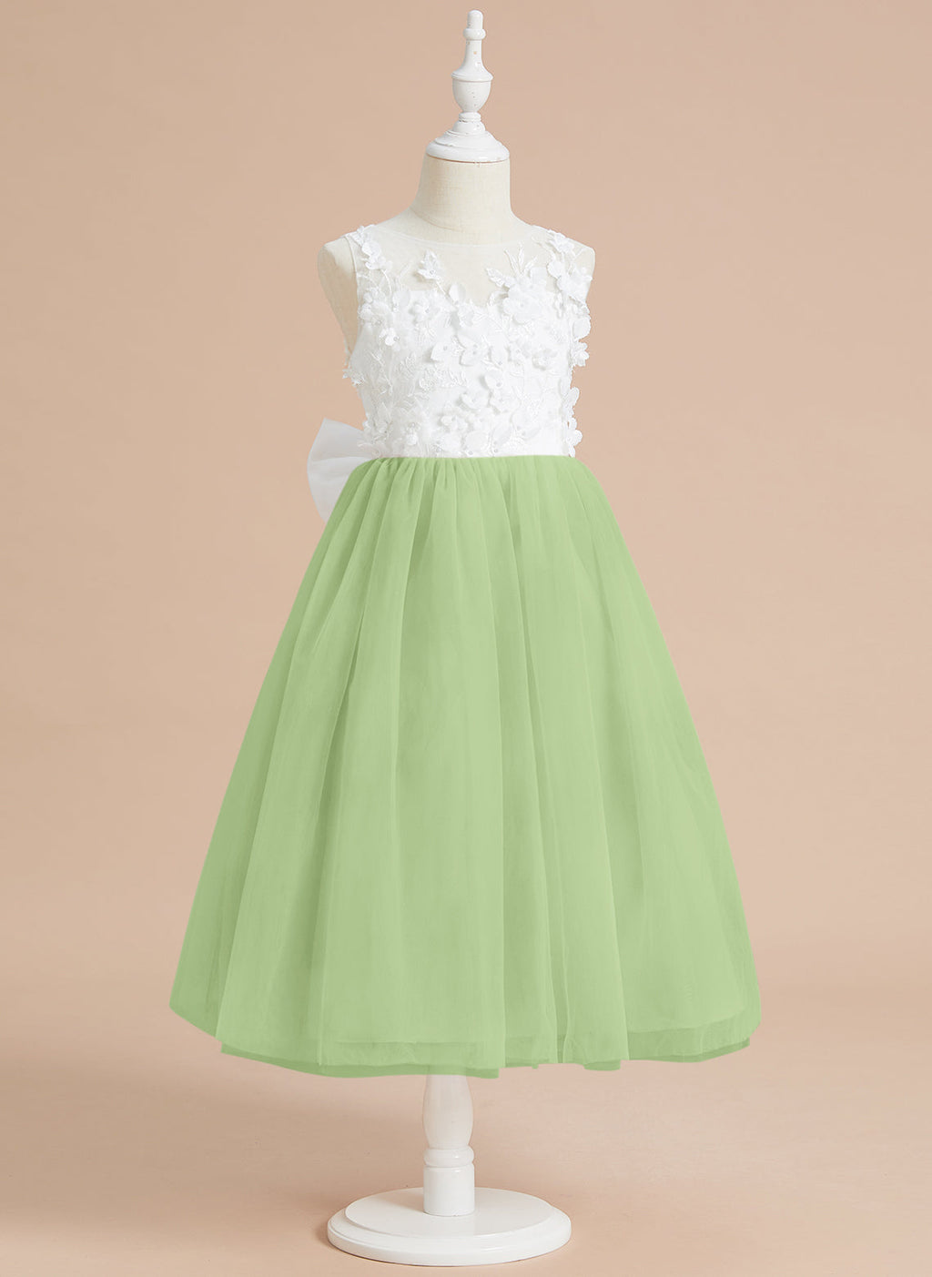 Vestido midi de encaje floral y lazo grande 