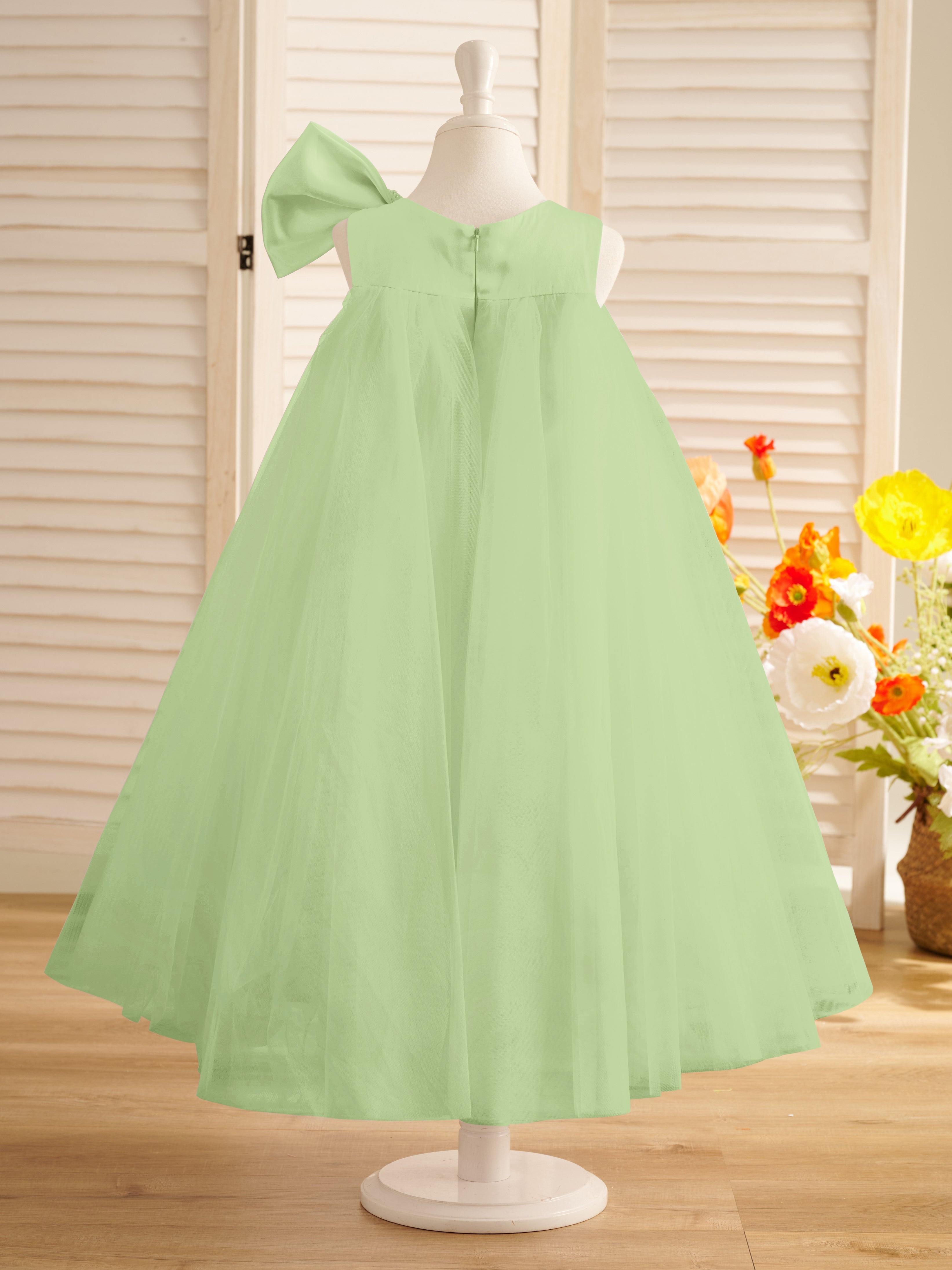 Vestido de niña pequeña de las flores, corte en A, con gran lazo y tul, hasta la rodilla. 