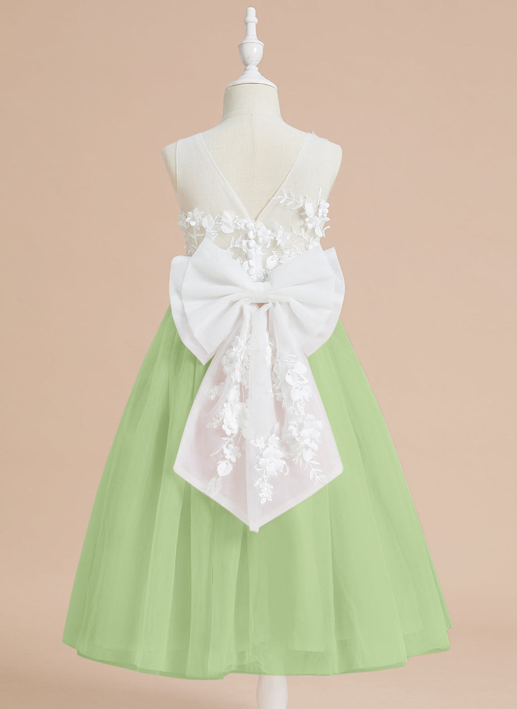 Vestido midi de encaje floral y lazo grande 