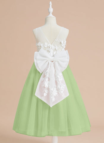 Vestido midi de encaje floral y lazo grande 