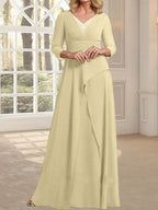 Vestido de gasa de corte A, escote en V, largo hasta el suelo, para la madre de la novia, con plisados ​​y cuentas.